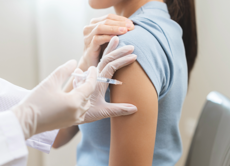 a client in the clinic receiving an intramuscular injection