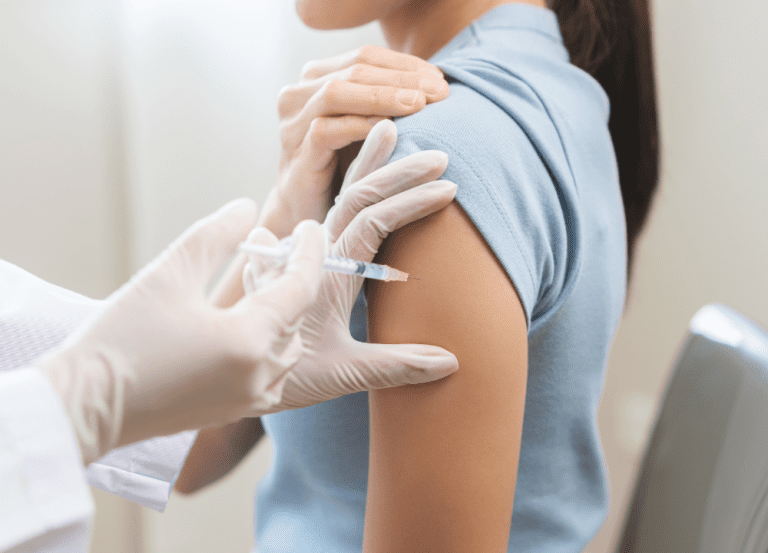 a client in the clinic receiving an intramuscular injection