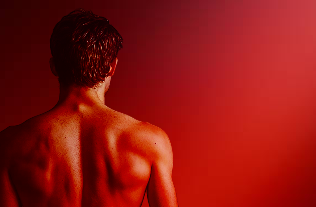 Man stood reieving red light therapy