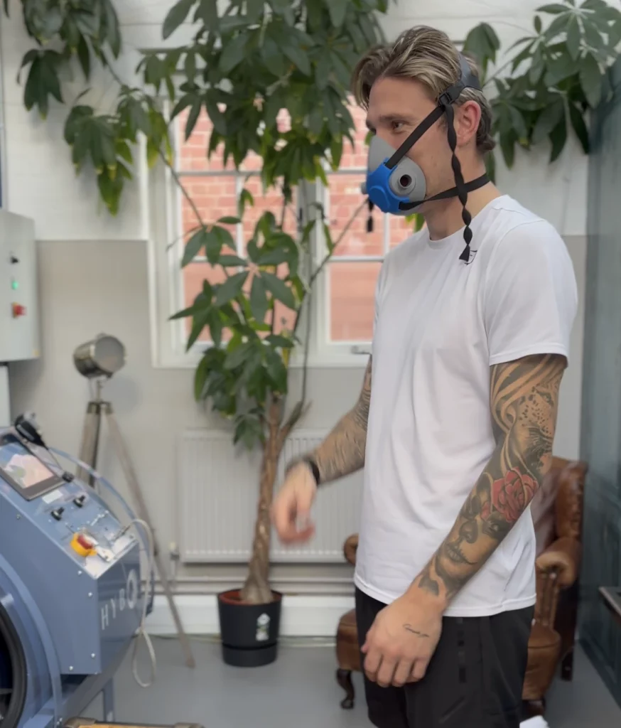 Angus MacDonald at HybO2, wearing a hyperbaric mask before entering the hyperbaric chmaber